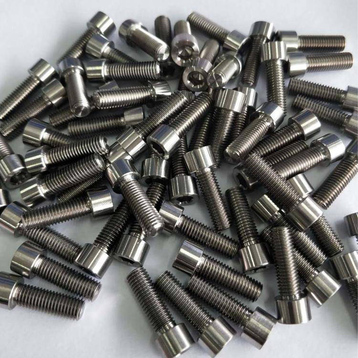 Race-Spec Grade 5 Titanium Flange Shoulder Bolts | Custom Anodized Metric Step Screws