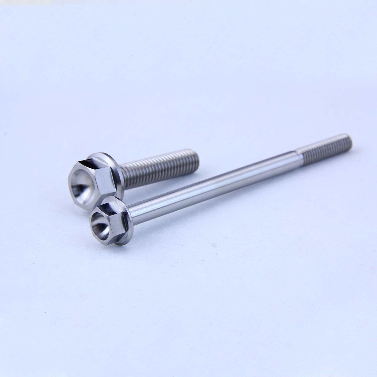 Race-Spec Grade 5 Titanium Flange Shoulder Bolts | Custom Anodized Metric Step Screws